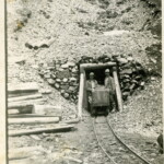 Charlie and Gus Ekburg at the portal to their Black Di'Mond mine in Tomahawk Basin. Circa 19-teens.