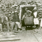 Gus and Charlie Ekburg at their Black Di'Mond mine portal. Beda Ekburg standing on the far right. Other sitting woman may be a rare photo of Gus's first wife Mary