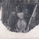 Elvira (Ekburg) Alexander, Edwin Ekburg and Axel Cedarwall with Brownie? at Axel's cabin in La Plata City, Colorado. Circa 1940-43