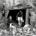 "Little" Charlie coming out of upper Tomahawk mine entry, Below Black Di'Mond mine. Circa 1974